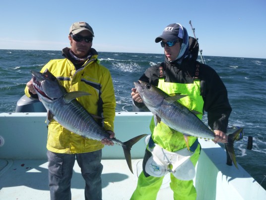 Capt. Charlie Ellis and Capt. Todd Malicoat with a pair of Yellowfin Tunas