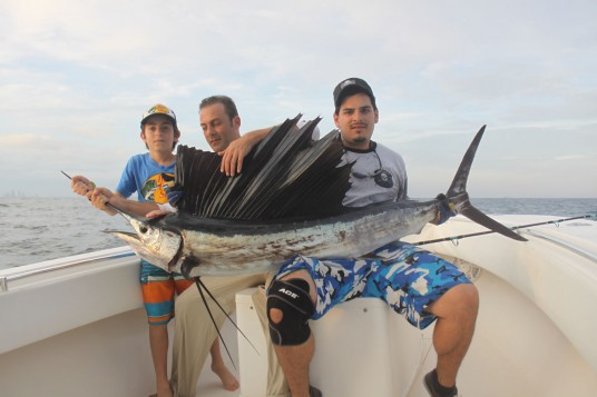 Junior Angler with Big Miami Sailfish