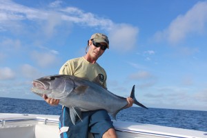 Capt Charlie Ellis of Miami, FL with a big amberjack caught vertical jigging