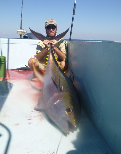 Capt Charlie Ellis of Miami, FL with a big venice, LA yellowfin tuna